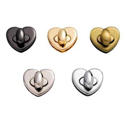 China Fashion bags heart shape automatic turn lock hook, handbag lock, purse twist lock for sale