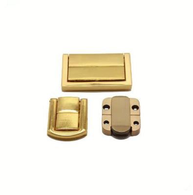 China Fashion bag accessories wooden box hardware automatic lock, jewelry box metal clasp locks, wine case lock clasp for sale