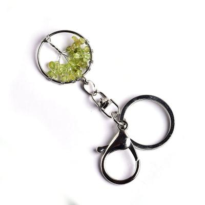 China All Ages Hot Selling Natural Peridot Crystal Tree Of Life Key Chain Crafts Gifts Men And Women Crystal Decorations for sale