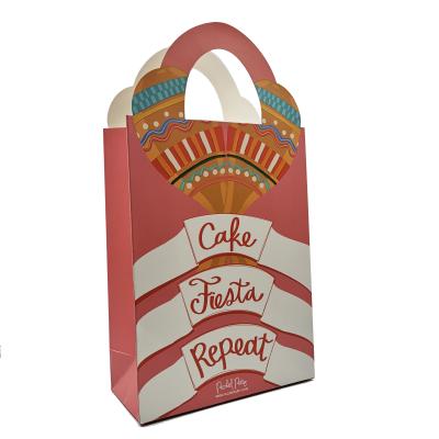 China Lovely CMYK Carrier Large Christmas Shopping Bags 350G Spot Printed Paper Carrier FLEXOGRAPHIC for sale