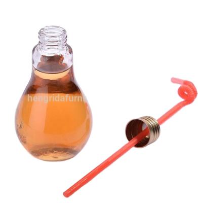 China Viable Creative Lamp Bulb Shape Glass Bottles With Drinking Straw Metal Lid For Juice for sale