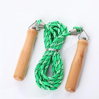 China Diet Wear-resistant Handle Adult Wooden Cotton Spring Equipment Fitness Sports Jumping Rope Student Rubber Jump Rope for sale