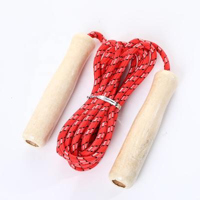 China Children's Student Diet Sports Skipping Rope 2.6m Solid Wooden Handle Hollow Cotton Single Fitness Jump Rope for sale