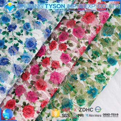 China Beautiful elastic wholesale flowers design glitter to mesh leather fabric for sale