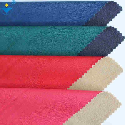 China Full Grain Soft Hand Feel Garment Leatherette Fabric 0.8mm PU Material Leatherette Abrasion-Resistant for sale