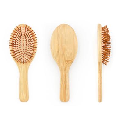 China Lady's Favorite Hot - Selling Cushion Of Bamboo Oval Padded Paddle Brush Massaging Scalp for sale