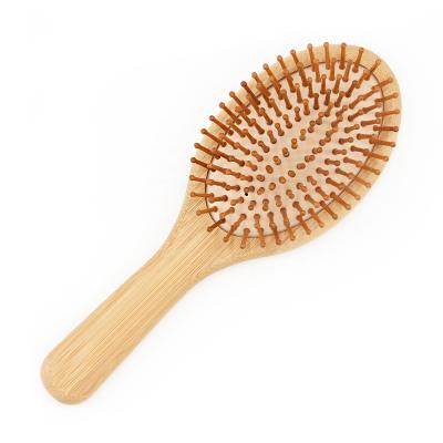 China Cushion Paddle Type Oval Hair Brush Anti-static Massage Hair Hand Craft Pulp Brush for sale