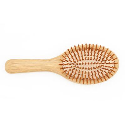 China Cushion Customized Wholesale Natural Bamboo Biodegradable Oval Paddle Brush Environmental Protection for sale