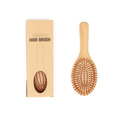 China Hot Selling Wholesale Bamboo Hairbrush Cushion 100% Comfortable Handle Detangling Paddle Wooden Hair Brush for sale