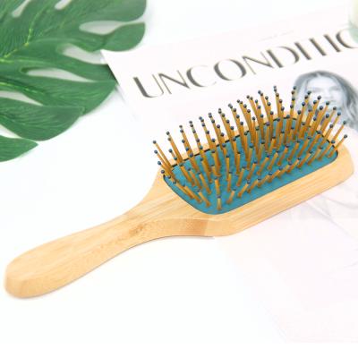 China Paddle Factory Price Paddle Brush Customized Logo Natural Bamboo Paddle Detangling Hair Brush for sale