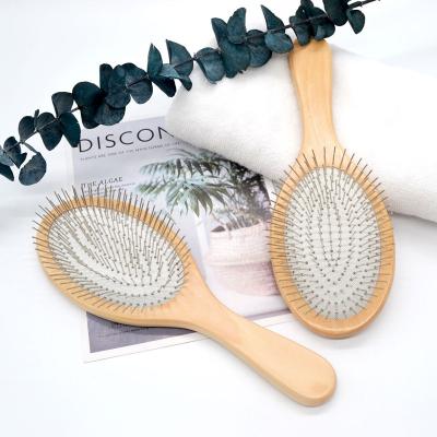 China Cushion New Arrival Custom Logo Natural Wooden Metal Pin Paddle Brush Hair Detangling Brush Wholesale for sale