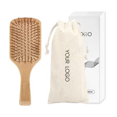 China Hot Sale Cushion Hair Brush Eco-friendly Detangle Massage Around Paddle Bamboo Hair Brush With Customized Logo for sale