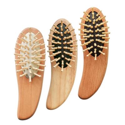 China Natural Wood Air Cushion Logo Paddle Brush Mango Style Mini Detangle Baby Hair Brush Customized Cushion Customized for sale