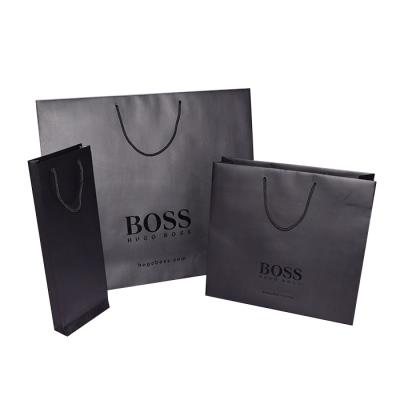 China Recycled Materials Wholesale Paper Bag Custom Bags Gift Packaging Black Paper Bag With Handle for sale