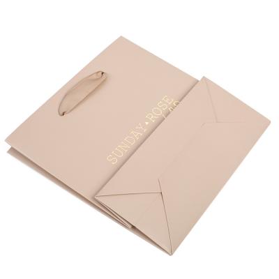 China Recycled Materials Paper Bags With Handle Paper Bag Packaging Custom Eco Friendly Paper Gift Bags for sale