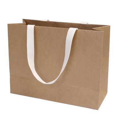 China Recycled Materials Wholesale Custom Logo Kraft Paper Bag With Paper Shopping Bag Packaging Handle for sale