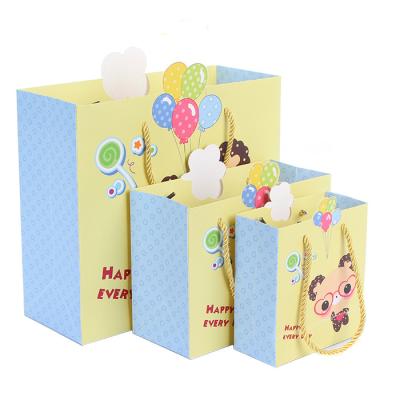 China Recycled Materials Custom Paper Bag For Kid Gift Paper Bags Printed Birthday Paper Gift Bag for sale