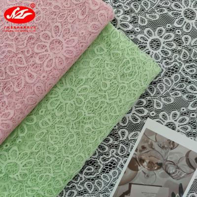 China OEM Factory 2022 Hot Selling Light Weight Stretch Spandex / Nylon White Lace Fabric For Dress for sale