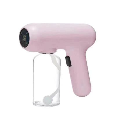 China Portable Cordless Handheld Mist Machine Disinfection Agriculture 300ML Atomization Vapor Blue Light Nano Spray Gun for sale