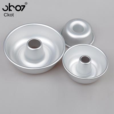 China Sustainable Cake Mold Hollow Cavity Round Solid Cake Mold Feng Qi Bottom Baking Mold For Oven for sale