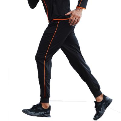 China Breathable Mens Sports Loose Pants Running Trousers Training Elastic Trousers for sale