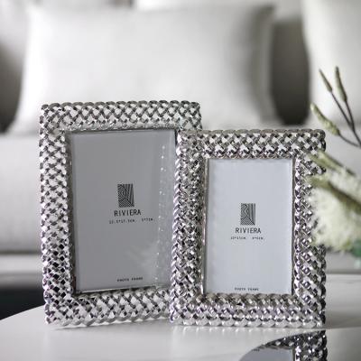 China Elegant Unique Luxury Design Home Decor Family Photo Frame Hollow-Cut Silver Square Picture Frame 6