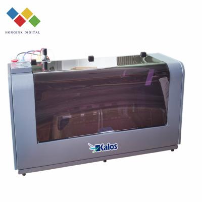 China Hotels DTF PET film T-shirt printer transfer film sublimation printer digital powder shaking machine for sale