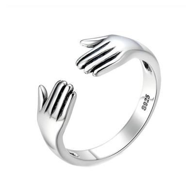 China Original Design 925 Sterling Silver Fashionable Adjustable Hug Hand Open Rings For Women Jewelry Girls for sale