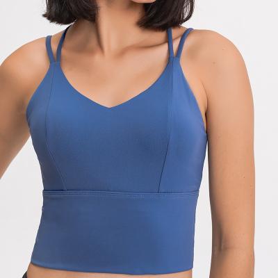 China Breathable Shockproof Light Weight Aplet Cross Women Yoga Gym Sports Bra Wireless Tank With Pads Women Yoga Sports Bra for sale