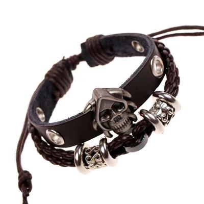 China Handmade Punk Woven Charm Bracelet Skull Jewelry Beaded Womens Mens Leather Bracelet for sale