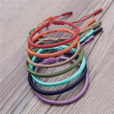 China BOHEMIA Toppik seven lucky red colors yoga bracelets vajra handmade knot woven rope bracelet women for sale