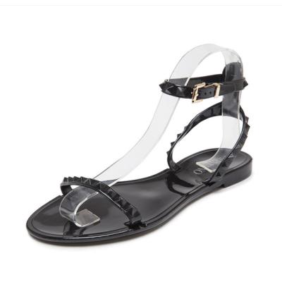 China Anti-slippery fancy flat sandal simple design rivet cheap women ladies freeze shoes 2021, studded sandals for sale