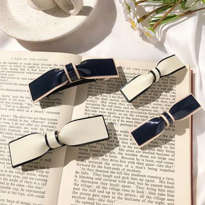 China Hot New 2021 Fashion Women's Insti Fashionable Simple Wild Elegant Word Bow Hair Clip Hairpin Acrylic Soft Hair Accessories for sale