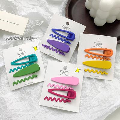 China Hollow Metal Duck Mouth Clip Small Fresh Hot Candy Color Fashion Soft Wave Pattern Word Clip Girl Hairpin 4 Packs One for sale