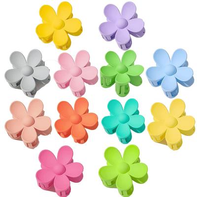 China Hot Sale Decoration 4cm/7cm Big Flower Hair Claw Clips Clip Claw Shape Plastic Matte Candy Colors Grab Daisy Flower Hair Clip Hair Claws for sale