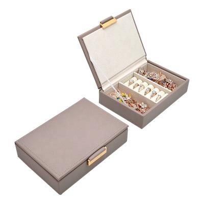 China Recyclable Simple Leather Tray Stunning Stackable Jewelry Store Display Jewelry Trays With Metal Plate for sale