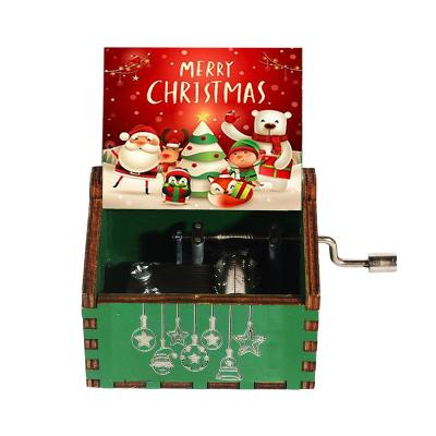 China Music Mini Hand Crank Merry Christmas Wood Crank Laser Engraved Color Printing UV Music Box for sale