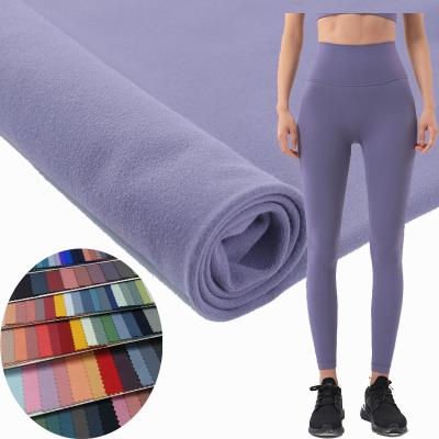 China High Quality Brushed Sueded 230 GSM Instock 78% Polyester 22% Spandex Fabric For Yoga Leggings And Pants for sale