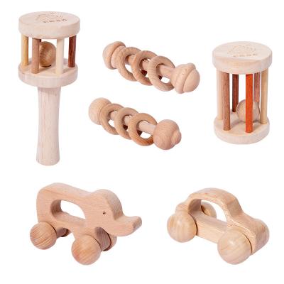 China Montessori Earlier Infant Beech Education Trolley Toy Hand Rattle Early Education Solid Wood Comfort Toy for sale