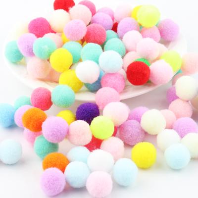 China Auto Upholstery Colored Pom Poms Kids Handmade Accessories Flutty Soft 25mm Pom Pom Polyseter Material Elastic Pompoms DIY for sale