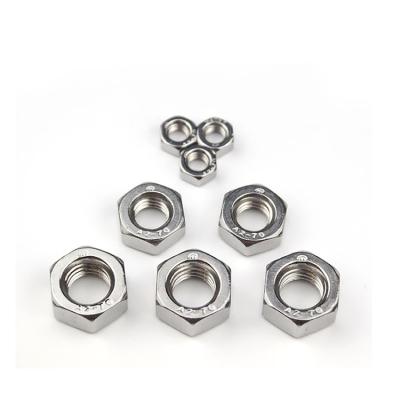 China Stainless Steel Self Locking Hex Nut Heavy Industry Din934 Flange Clamping Nuts for sale