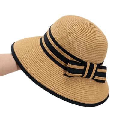 China 2022 Newest Design Simple Straw Hat Flat Wide Brim Sunscreen Bowknot Straw Hat Custom Women Elegant Beach Hat Comfortable Retro for sale