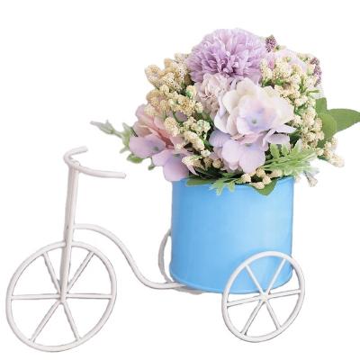 China Pastoral Mini Bicycle Handmade Light Blue Flower Stand Plant Stand with Wheels Metal Planter Pots for sale