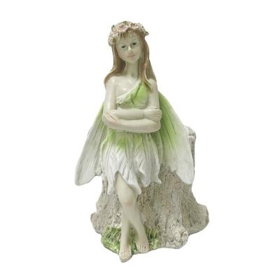 China Decoration Garden Creative Fairy Figurine Handmade Polyresin Carved Outdoor Flower Pot for sale