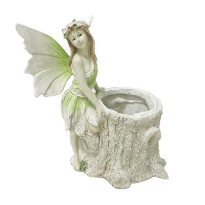 China Polyresin Handmade Carved Outdoor Decorative Garden Flower Pot Decorative Handmade Angel for sale