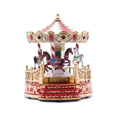 China Beautiful 2021 Best Selling Automatic Carousel Plastic Horse Merry Christmas LED Light Dancing Music Box for sale