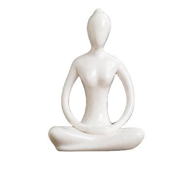 China Simple modern handmade wholesale ceramic white yoga crafts statue whetstone decorations for sale