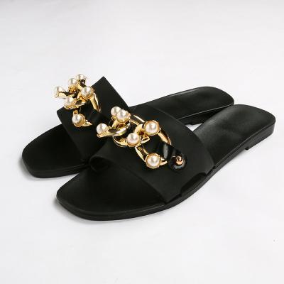 China New fashion square fashion pearl women's main chain design jelly sandals slip non slip flats freeze shoes for sale