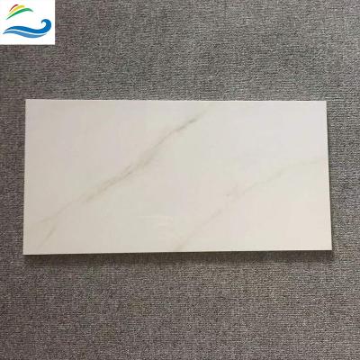 China Modern porcelain interior wall wholesale ceramic tiles 300*600 mm tiles glossy surface marbles full body ceramic tiles for hotel for sale