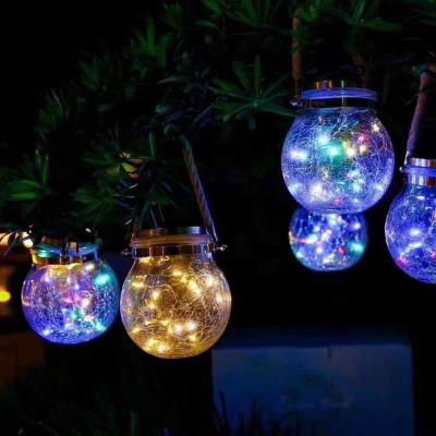 China Custom Hot Sale Hanging Solar Fairy Dewdrop Lighting Outdoor Antique Globe Garland Solar Crackle Glass Ball Light For Garden for sale